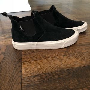 Women’s Black High Top Vans Sneakers